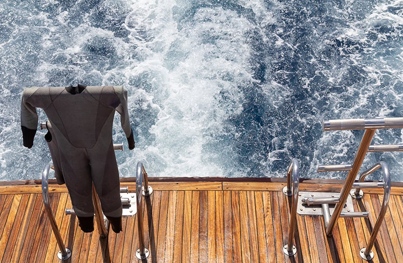 Wetsuit On A Boat